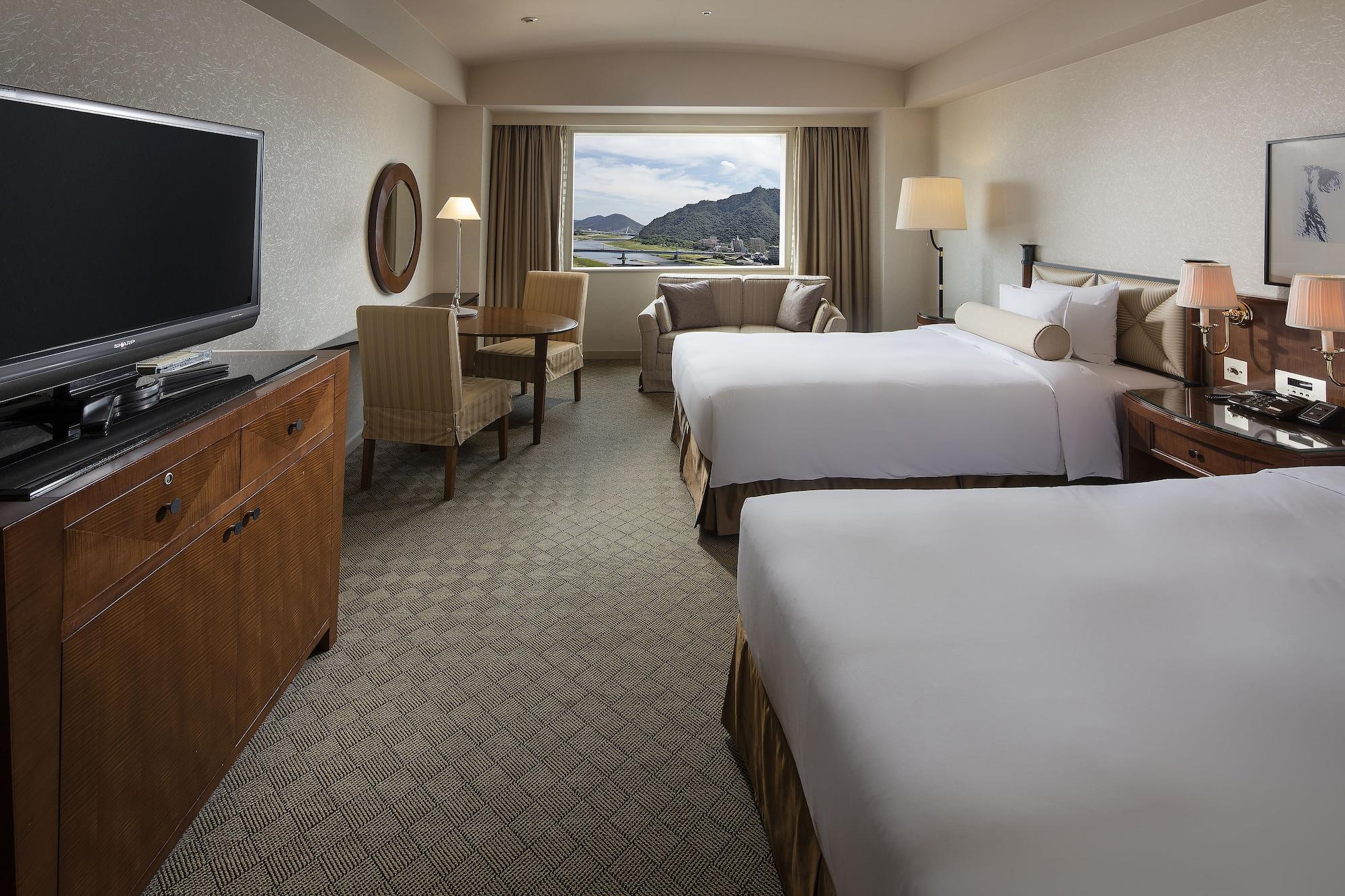 Miyako Hotel Gifu Nagaragawa Buitenkant foto A guest room at the Hilton San Francisco